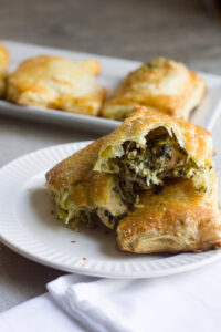 Copycat Pesto Chicken Hot Pockets are an excellent alternative to the store bought version. Use your own puff pastry or the recipe included and swap the ingredients to make it your own!