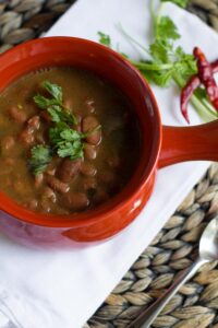 Tex Mex Charro Beans. The easiest "set-and-forget" slow cooker dish that will leave your house smelling like Tex Mex heaven.