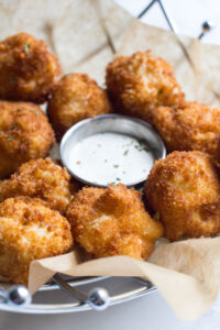 Take a load off with these awesome fried macaroni and cheese bites. Great as an appetizer or to serve at a party - and the macaroni itself is delicious on its own.