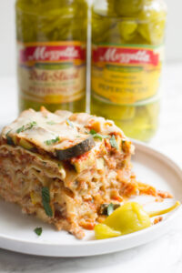 This crock pot vegetable lasagna makes for an easy dinner with bright, fresh, notes of zucchini, squash and peperoncini.