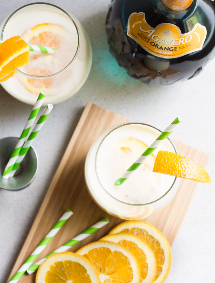 A creamy blend of orange and vanilla, this recipe for the ultimate creamsicle margarita is always a hit! #ad
