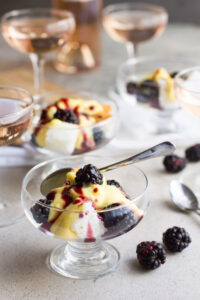 Champagne mousse, or sabayon, is a fast and light dessert served atop angel food cake and topped with blackberries. The perfect light, yet flavorful dessert to be enjoyed in the fall or year round! #ad