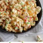 This sweet and salty popcorn recipe is made using white chocolate. It makes the perfect movie night snack, party favor, or christmas gift!