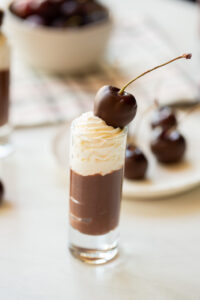 Wine Soaked Chocolate Covered Cherries are a super easy, yet elegant way to end a meal. Wow your friends with this delicious, deceptively simple dessert!