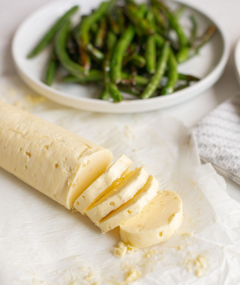 homemade garlic butter sliced and served with green beans