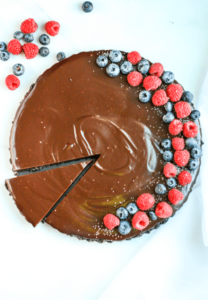 chocolate ganache tart with berries on top