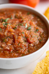 roasted red salsa in a white bowl