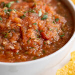 A simple and easy roasted red salsa that's perfect for Taco Tuesday, and some tips to help you make the best homemade salsa ever!