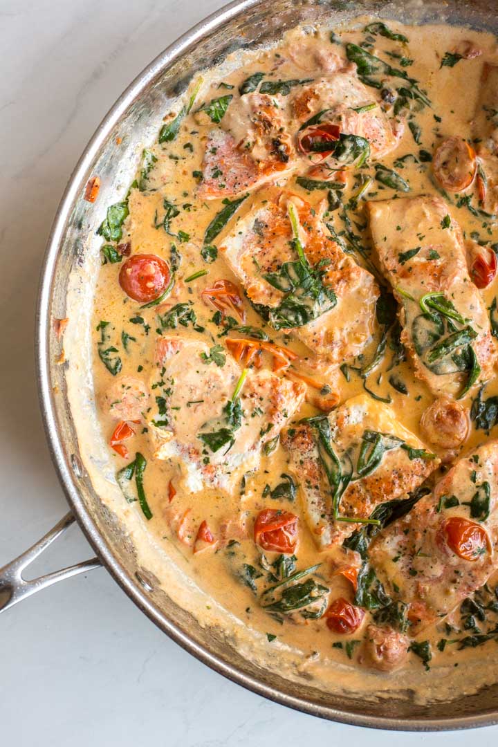 Pan Seared Salmon with Creamy Spinach and Tomatoes