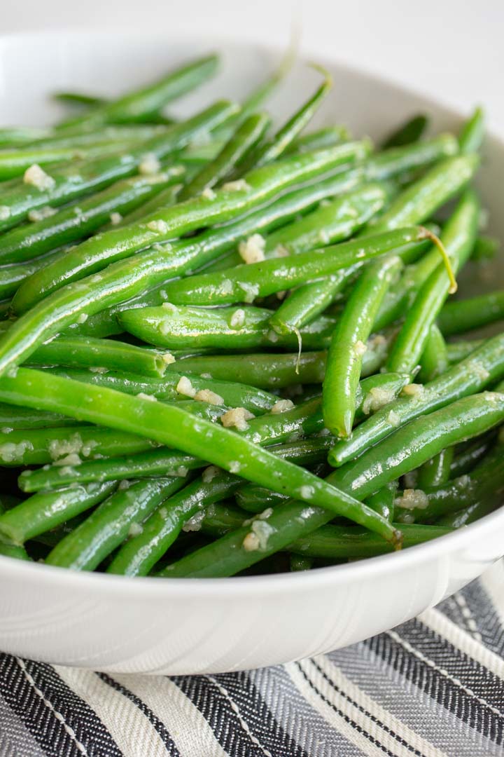 garlic green beans in a bowl on a table