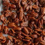These spicy candied pecans are sweet, spicy, salty and downright addicting. Make them in the slow cooker for an easy, hands-off experience and fill your kitchen with wonderful aromas! They're great for topping salads, party snacks, and even homemade gifts!