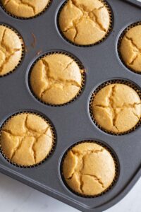 top of mini pumpkin cheesecakes in a pan