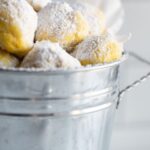 Lemon shortbread cookies dusted in powdered sugar makes these awesome lemon snowball cookies. They're fun, fresh and vibrant in the springtime and excellent for holiday cookie shares!
