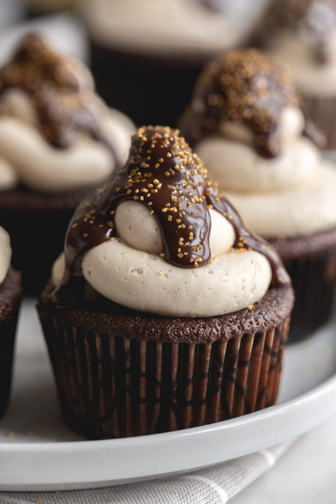 close up of a kahlua cupcake with golden sprinkles