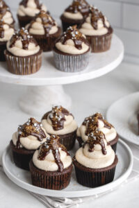 frosted kahlua cupcakes on a plate and cake stand