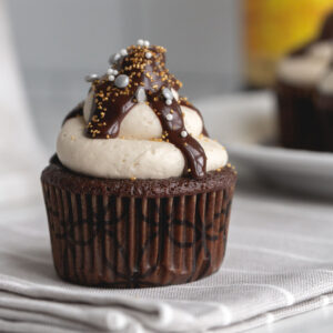 close up of a kahlua cupcake with gold and silver sprinkles