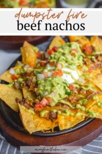 These restaurant style beef nachos are a great way to celebrate all trash fires in life: with chips, seasoned beef, cheese, and more, baked easily in cast iron or on a sheet pan in the oven. Top it with a spicy homemade green fire sauce.